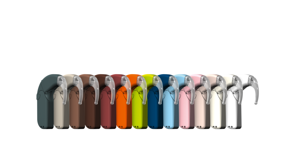 A line up of Med El cochlear implant processors in a rainbow of colors