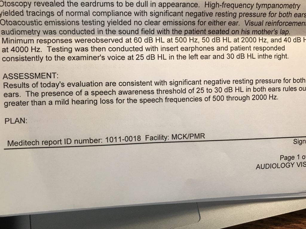A photo of a narrative portion of an audiology report that details negative resting pressure, hearing in the soundfield at 40-60dB, and a speech awareness threshold of 25 to 30 dB. 